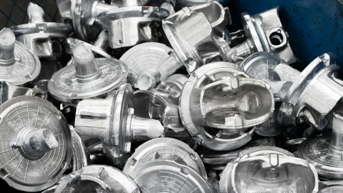 A pile of metal parts sitting next to each other